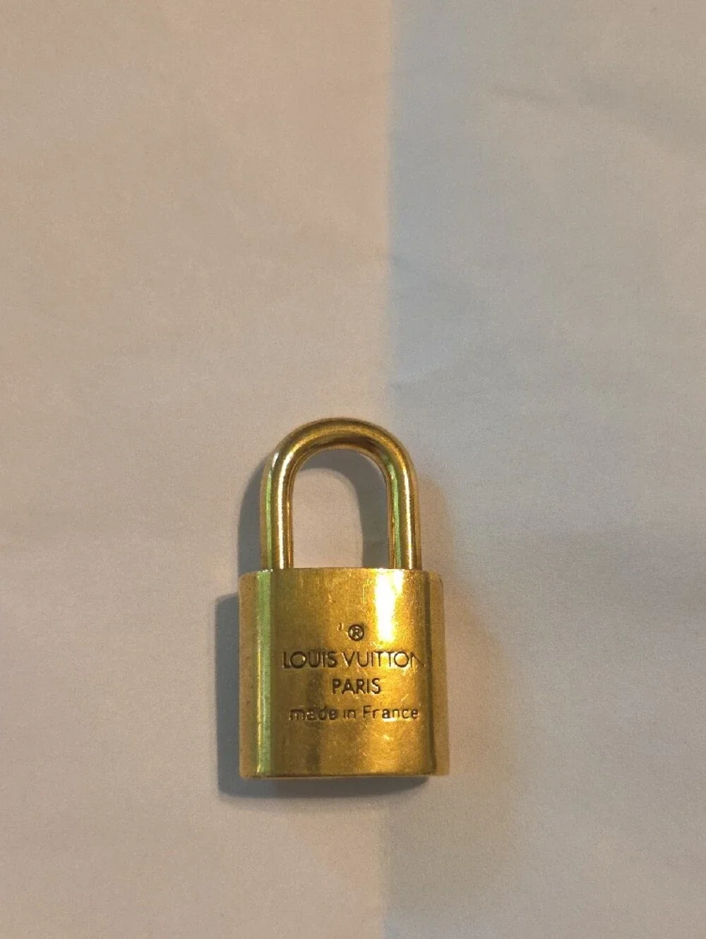 Louis Vuitton Gold-Tone LV Lock Charm